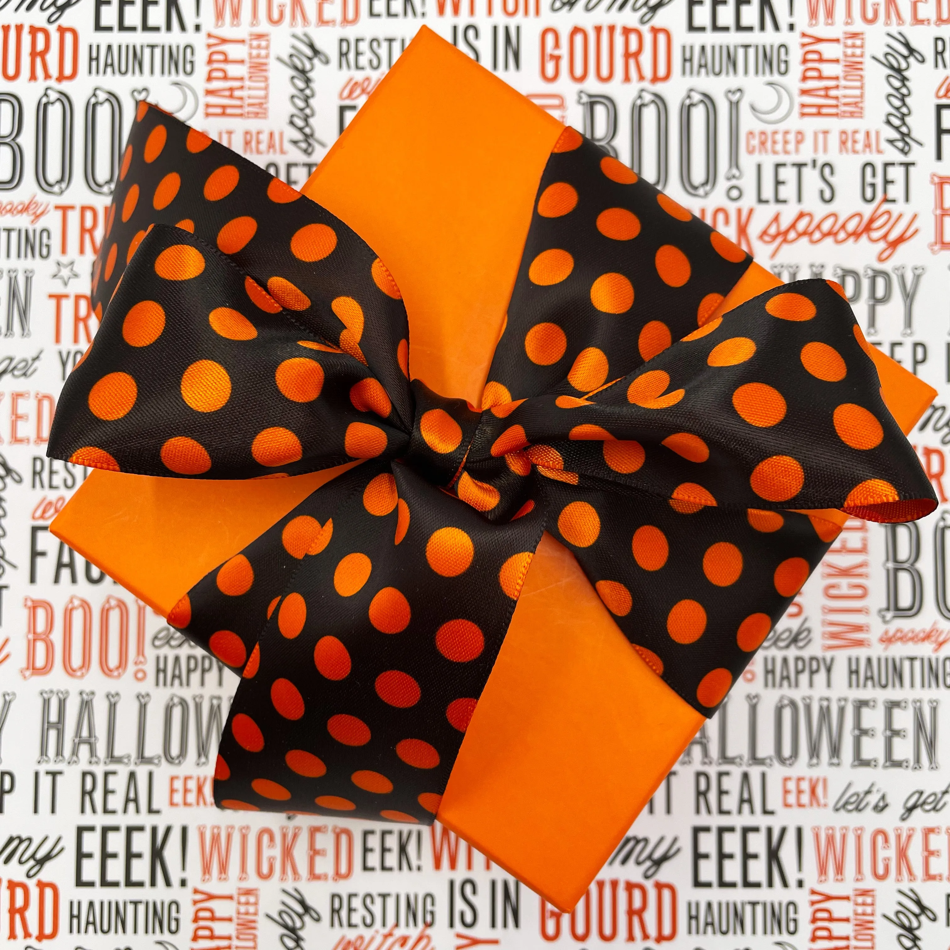 Orange Polka Dot ribbon on  orange on black for Halloween treats  printed on 5/8", 7/8" and 1.5"  orange satin